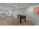 Finished basement featuring a foosball table and minimalist abstract art at 5816 Sand Pebble Pl, Raleigh, NC 27613
