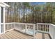 View from the wooden deck overlooking the private backyard and pool at 5816 Sand Pebble Pl, Raleigh, NC 27613