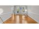 Bright office space features hardwood floors, natural light, and desk at 5816 Sand Pebble Pl, Raleigh, NC 27613