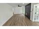 Spacious living room with sleek flooring, contemporary fireplace feature, and abundant natural light, perfect for relaxation at 5920 Holly Dr, Raleigh, NC 27616