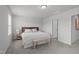 Serene bedroom shows neutral decor, lots of natural light, and comfortable furnishings at 6309 Truxton Ln, Raleigh, NC 27616