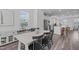 Inviting dining room with wood floors, natural light, modern table and chairs, and contemporary decor at 6309 Truxton Ln, Raleigh, NC 27616