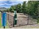 Community dog park featuring agility equipment and lush greenery, perfect for pet owners at 6309 Truxton Ln, Raleigh, NC 27616