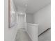 Upstairs hallway boasts carpeted floor and neutral colored walls at 6309 Truxton Ln, Raleigh, NC 27616