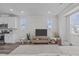 Inviting living room with open layout, modern decor, and seamless flow to the kitchen at 6309 Truxton Ln, Raleigh, NC 27616