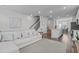 Open-concept living area shows seamless transition to kitchen and dining, creating a spacious feel at 6309 Truxton Ln, Raleigh, NC 27616