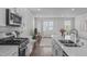 Stylish living room showcases open layout, hardwood floors, and modern decor at 6309 Truxton Ln, Raleigh, NC 27616