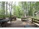 Enjoy a backyard featuring an elevated deck and lush greenery, perfect for relaxation at 6417 Meadow View Dr, Raleigh, NC 27609