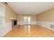 Spacious living room features a brick fireplace and access to the outdoor deck at 6417 Meadow View Dr, Raleigh, NC 27609
