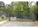 Community playground featuring climbing and sliding activities in a secure fenced area at 6417 Meadow View Dr, Raleigh, NC 27609