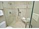 Bathroom featuring a glass enclosed shower and built-in bench at 6417 Meadow View Dr, Raleigh, NC 27609