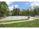 View of the community tennis court, perfect for recreational activities and enjoying the outdoors at 6417 Meadow View Dr, Raleigh, NC 27609