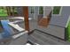 Poolside view of the outdoor patio featuring a charming staircase and a seamless transition to the house at 6521 Camellia Creek Dr, Raleigh, NC 27603