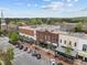 Picturesque aerial view of a downtown area with diverse storefronts and a charming town layout at 700 Market St # 214, Chapel Hill, NC 27516