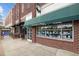 Brick building storefront with awning-covered windows, showcasing Wentworth & Sloan jewelry store at 700 Market St # 214, Chapel Hill, NC 27516