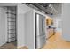 Modern kitchen with stainless steel refrigerator at 700 Market St # 214, Chapel Hill, NC 27516