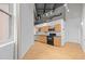 Modern kitchen with wood cabinets and hardwood floors at 700 Market St # 214, Chapel Hill, NC 27516