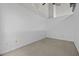 An empty room with neutral carpet and white walls is a blank canvas, ready to be personalized to your liking at 700 Market St # 214, Chapel Hill, NC 27516