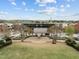 Picturesque town square featuring a stage and lush green lawn, ideal for community events at 700 Market St # 214, Chapel Hill, NC 27516
