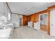 Spacious kitchen with ample cabinetry, laminate floors, and lots of counter space at 706 Forest Dr, Garner, NC 27529