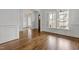 Bright living room with hardwood floors, large windows, and elegant finishes at 711 Virginia Ave, Raleigh, NC 27604