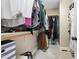 Walk-in closet featuring ample shelving and storage space for organized living at 7252 Bedford Ridge Dr, Apex, NC 27539