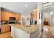 Spacious kitchen with granite countertops, stainless steel appliances, and an open layout to the living areas at 7252 Bedford Ridge Dr, Apex, NC 27539