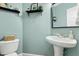 Stylish powder room featuring a sleek sink and decorative accents at 7252 Bedford Ridge Dr, Apex, NC 27539