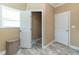The hallway features an open closet space and neutral flooring, with ample room for storage at 8079 Stone Heritage Rd, Middlesex, NC 27557