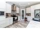 Beautiful kitchen showcasing stainless steel appliances, granite countertops, and wooden floors at 8079 Stone Heritage Rd, Middlesex, NC 27557