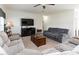This cozy living room features plush furniture and a ceiling fan at 8079 Stone Heritage Rd, Middlesex, NC 27557