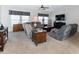 A cozy living room offers comfortable seating, carpeting, and soft lighting, perfect for relaxation at 8079 Stone Heritage Rd, Middlesex, NC 27557