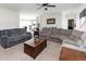 This open-concept living room seamlessly connects to the kitchen at 8079 Stone Heritage Rd, Middlesex, NC 27557