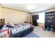 Cozy bedroom with traditional furniture and neutral carpeting at 8091 Stone Heritage Rd, Middlesex, NC 27557