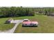 Spacious property featuring a cozy home, a garage, and a carport on a large green lot at 8091 Stone Heritage Rd, Middlesex, NC 27557