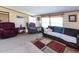 Cozy living room features comfortable seating and warm lighting at 8091 Stone Heritage Rd, Middlesex, NC 27557