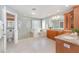Spacious bathroom featuring a glass-enclosed shower, soaking tub, and double sink vanity with granite counters at 8300 Clarks Branch Dr, Raleigh, NC 27613