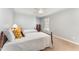 Comfortable bedroom featuring two beds, neutral walls and decor, for a relaxing and restful retreat at 8300 Clarks Branch Dr, Raleigh, NC 27613