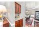 Butler's pantry features granite countertops, and custom wooden cabinetry at 8300 Clarks Branch Dr, Raleigh, NC 27613