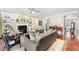 Comfortable living room featuring a fireplace, built-in shelves, and neutral décor at 8300 Clarks Branch Dr, Raleigh, NC 27613