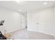 Versatile basement area with neutral carpet and trim, features closet space and room for customizable layouts at 1003 Canary Pepper Dr, Durham, NC 27713
