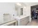 Spacious bathroom features dual sinks, vanity, mirror, and walk-in closet at 1003 Canary Pepper Dr, Durham, NC 27713