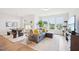 Bright and open living area with large windows and comfortable seating at 1003 Canary Pepper Dr, Durham, NC 27713