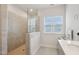 Modern shower boasts floor-to-ceiling tile and glass enclosure at 1003 Canary Pepper Dr, Durham, NC 27713