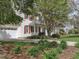 Well-maintained home with two-car garage, beautiful landscaping, and a charming front porch area at 1008 Brittley Way, Apex, NC 27502