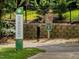 Greenway trail entrance clearly marked with signage and regulations, perfect for walking, jogging, and enjoying nature at 1008 Brittley Way, Apex, NC 27502