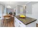 Kitchen with kitchen island and view of the dining area at 1008 Brittley Way, Apex, NC 27502