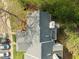 Top-down aerial view showing the roof and surrounding landscape, with cars parked nearby at 102 Choptank Ct # B5, Cary, NC 27513
