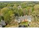 Beautiful aerial view of the residential area, surrounded by mature trees and ample parking space at 102 Choptank Ct # B5, Cary, NC 27513