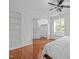 Bright bedroom with hardwood floors, a ceiling fan, and a window seat at 102 Choptank Ct # B5, Cary, NC 27513